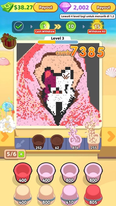 Gameplay pouring sand into a character puzzle